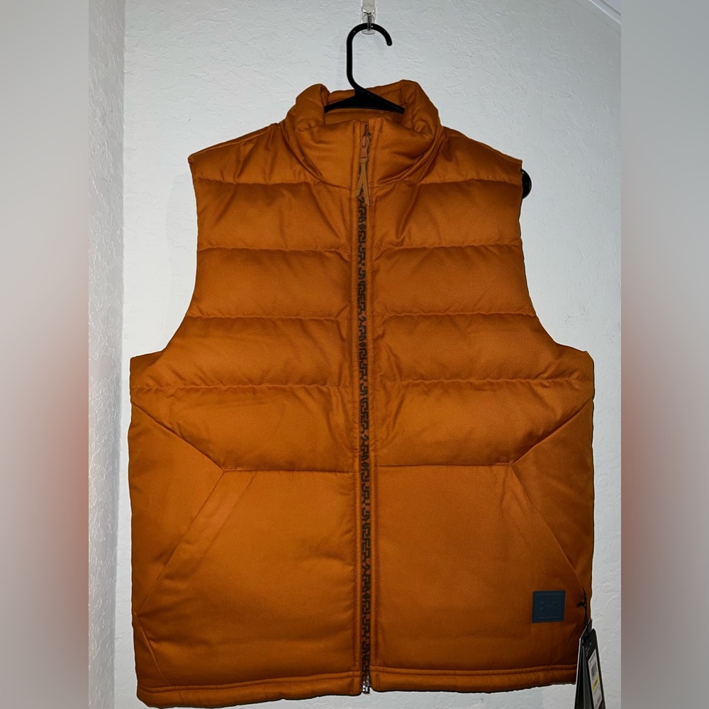 Elevate your winter with Men's UA Storm Sportstyle Down Vest by Under Armour